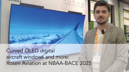 VIDEO: Rosen Aviation’s curved digital window at NBAA-BACE 2025 Justin Watson in front of curved digital window