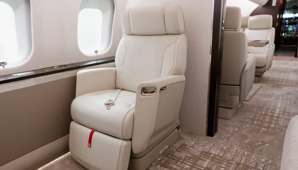 Close-up of cream leather seat in business jet