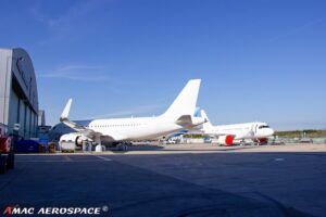 Commercial aircraft undergoing maintenance at AMAC Aerospace facility