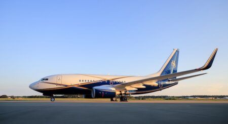 Action Aviation choses Gogo Galileo FDX Blue and white Boeing business jet on airport tarmac