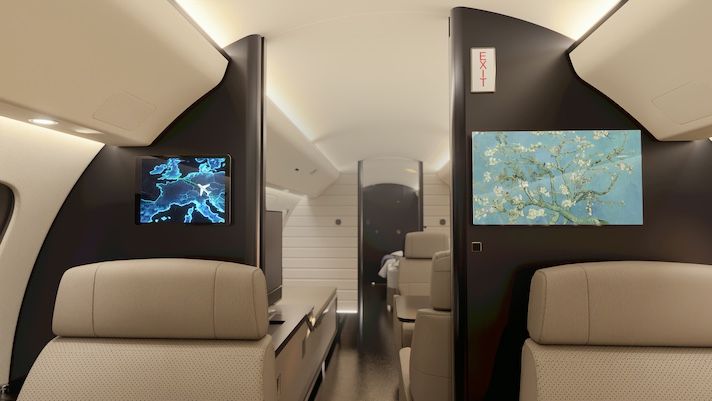 Luxury private jet cabin interior featuring cream leather seats, dark wood paneling, digital displays showing map and artwork
