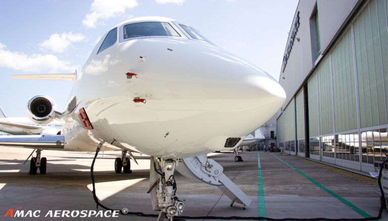 A Gulfstream G550 outside an AMAC Aerospace hangar