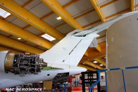 AMAC Aerospace completes Global XRS and B737 inspections Aircraft engine and wing under maintenance in AMAC hangar