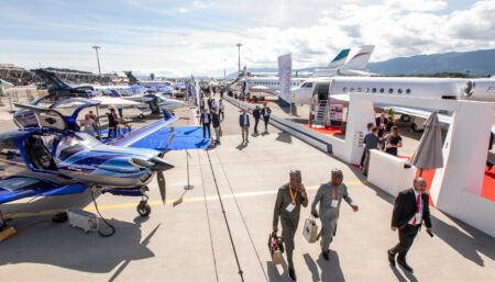 Aircraft display at outdoor aviation trade show event