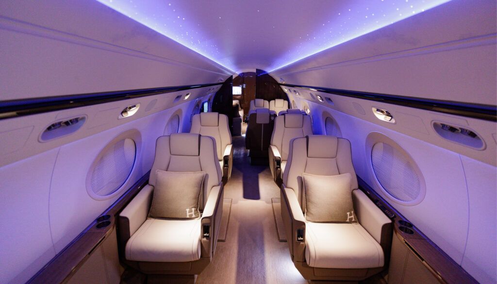 G550 business jet cabin with purple moodlighting and starlight headliner