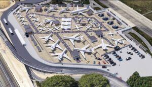 Aerial rendering of EBACE26 static aircraft display at Geneva Airport showing wide variety of business aircraft sizes and types on tarmac, plus exhibition chalets and visitor areas, surrounded by secure perimeter