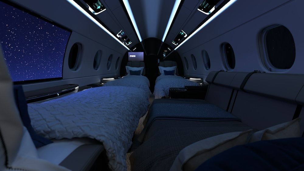 Praetor 600E business jet cabin with seats and divan converted into four lie-flat beds, darkened cabin with blue ambient lighting, with a starfield displayed on the Smart Window.