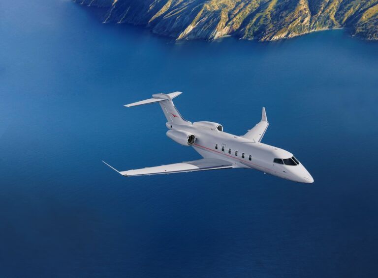 Vista places large Challenger 3500 order with Bombardier White Bombardier Challenger 3500 business jet flying over blue ocean and mountainous coastline