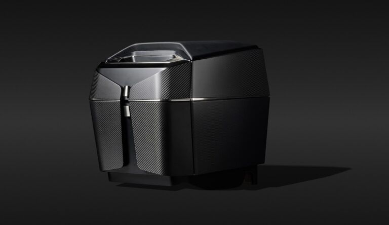 Dark cabinet with satin black varnish main structure and drawer fronts in matte carbon fibre