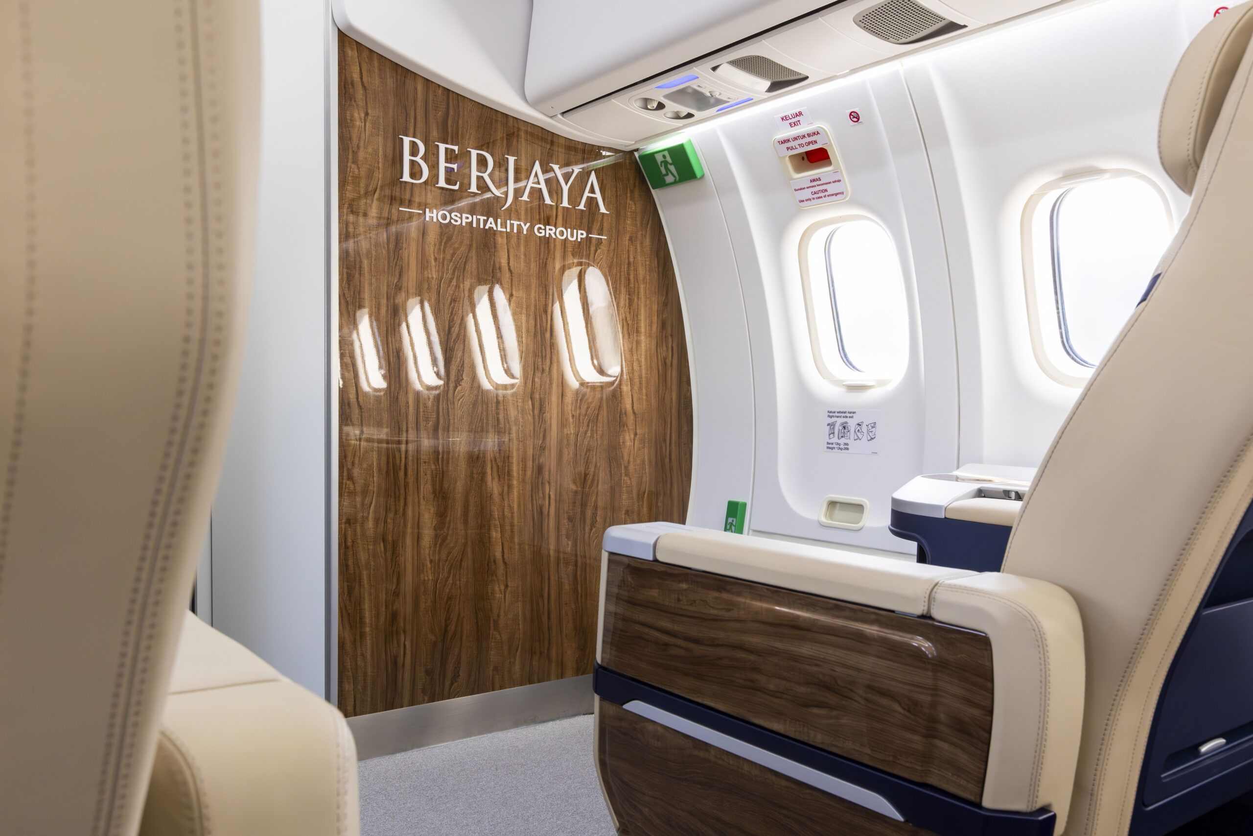 Berjaya Hospitality Group branded cabin divider panel on ATR aircraft