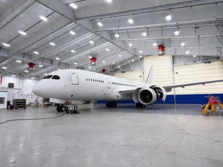 Greenpoint Technologies awarded BBJ 787-9 VVIP interior contract White Boeing 787 Dreamliner inside a VIP completion hangar