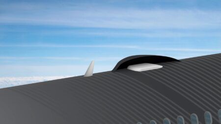 EASA certifies Gogo Galileo FDX for ACJs A close-up render of the fuselage roof of a business jet in flight, showing a fin and low-profile white satellite antenna housed beneath a aerodynamic fairing, with blue sky in the background.