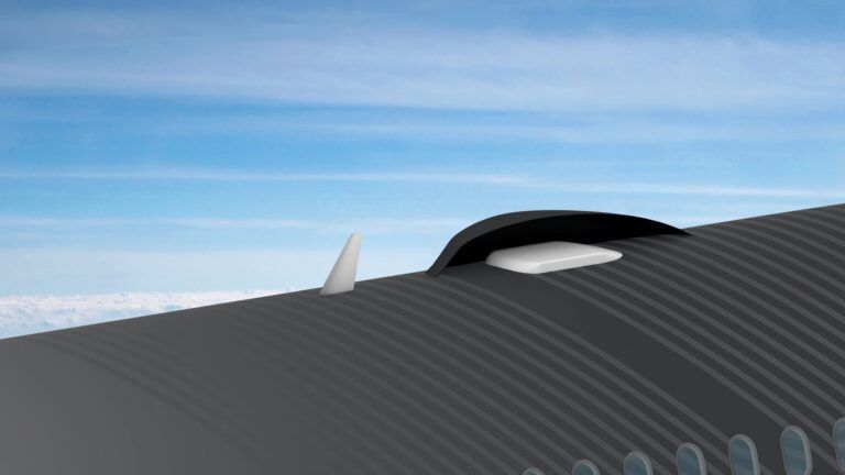 EASA certifies Gogo Galileo FDX for ACJs A close-up render of the fuselage roof of a business jet in flight, showing a fin and low-profile white satellite antenna housed beneath a aerodynamic fairing, with blue sky in the background.