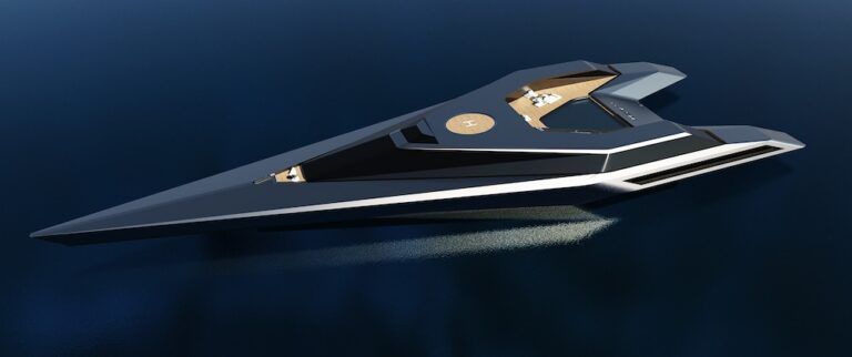 Aerial render of the Wotan concept speed yacht by Agnès Guiu Design, viewed from above on a dark, calm sea. The vessel features an extreme arrow-shaped hull in deep navy blue with white accent trim lines running along its edges. A helipad and open deck area with warm timber decking are visible amidships