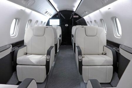 Duncan Aviation reveals modern Legacy 600 refurbishment Refurbished Embraer Legacy 600 cabin with white and grey leather seats
