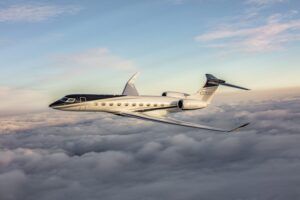 Gulfstream G700 aircraft flying above the clouds