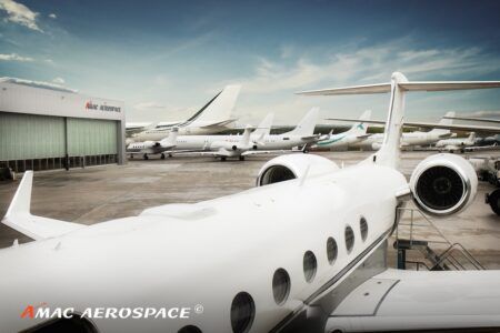 AMAC Aerospace installs Starlink on ACJ318 and G550 Business jets parked outside AMAC Aerospace’s facility in Basel, Switzerland