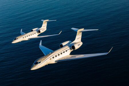 Gulfstream marks 400th G500 and G600 delivery A Gulfstream G500 and G600 business jet flying in formation over open water