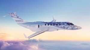Rendering of the HondaJet Echelon business jet in flight above clouds