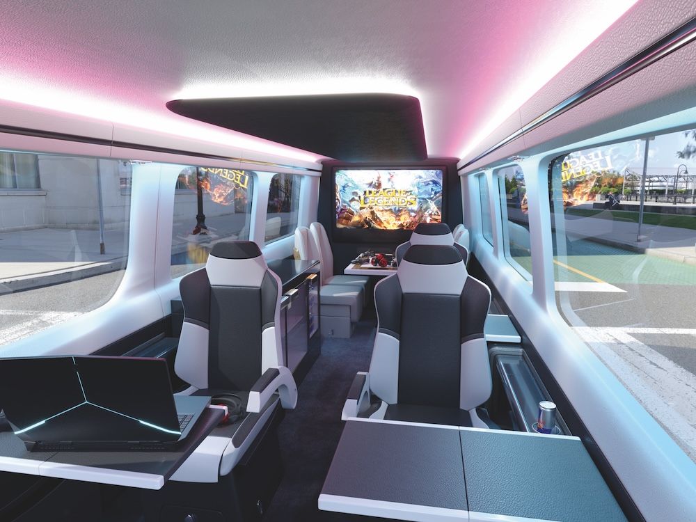 Wider view of Sprinter interior with chairs, mood lighting