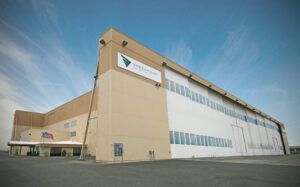 Large facility building with Greenpoint Technologies logo