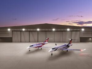 SyberJet SJ34 and SJ36 aircraft outside aircraft hangar